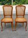 2 cane chairs in solid wood in Louis XV style from the 1970s.
