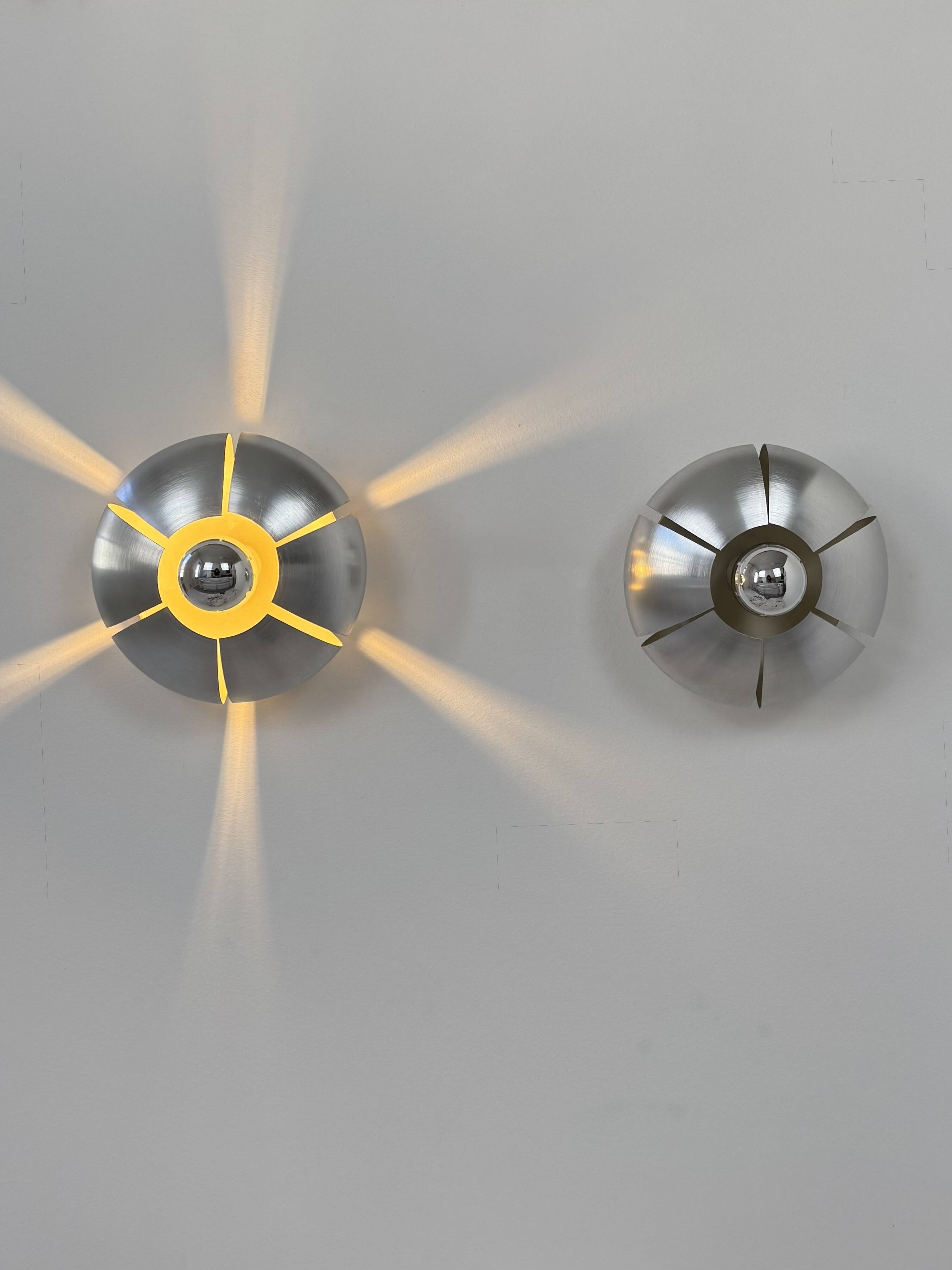 Pair of vintage wall lights, brushed aluminium, France, 1970.