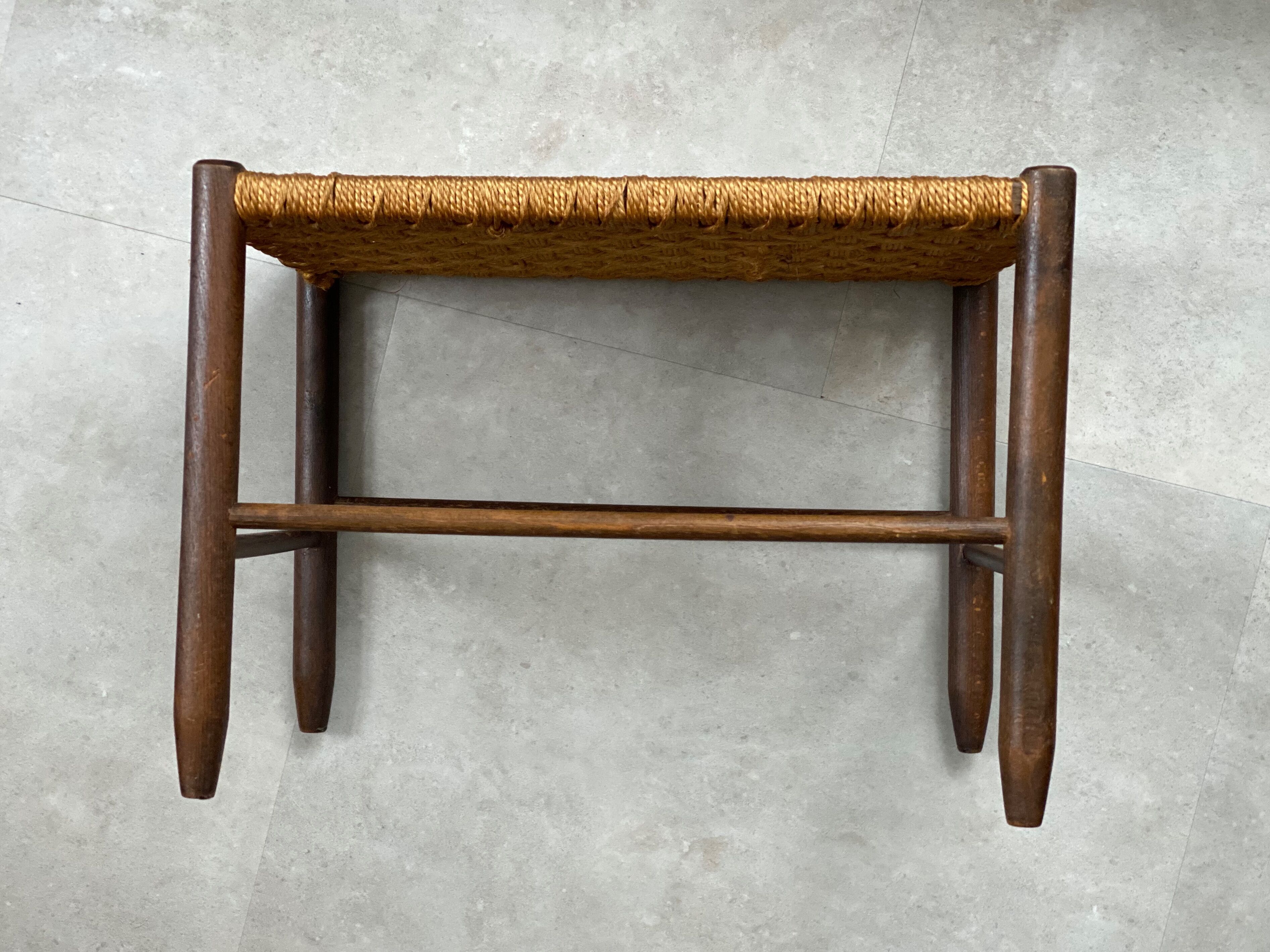 Mid Century wooden stool with a woven sisal seat