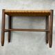 Mid Century wooden stool with a woven sisal seat