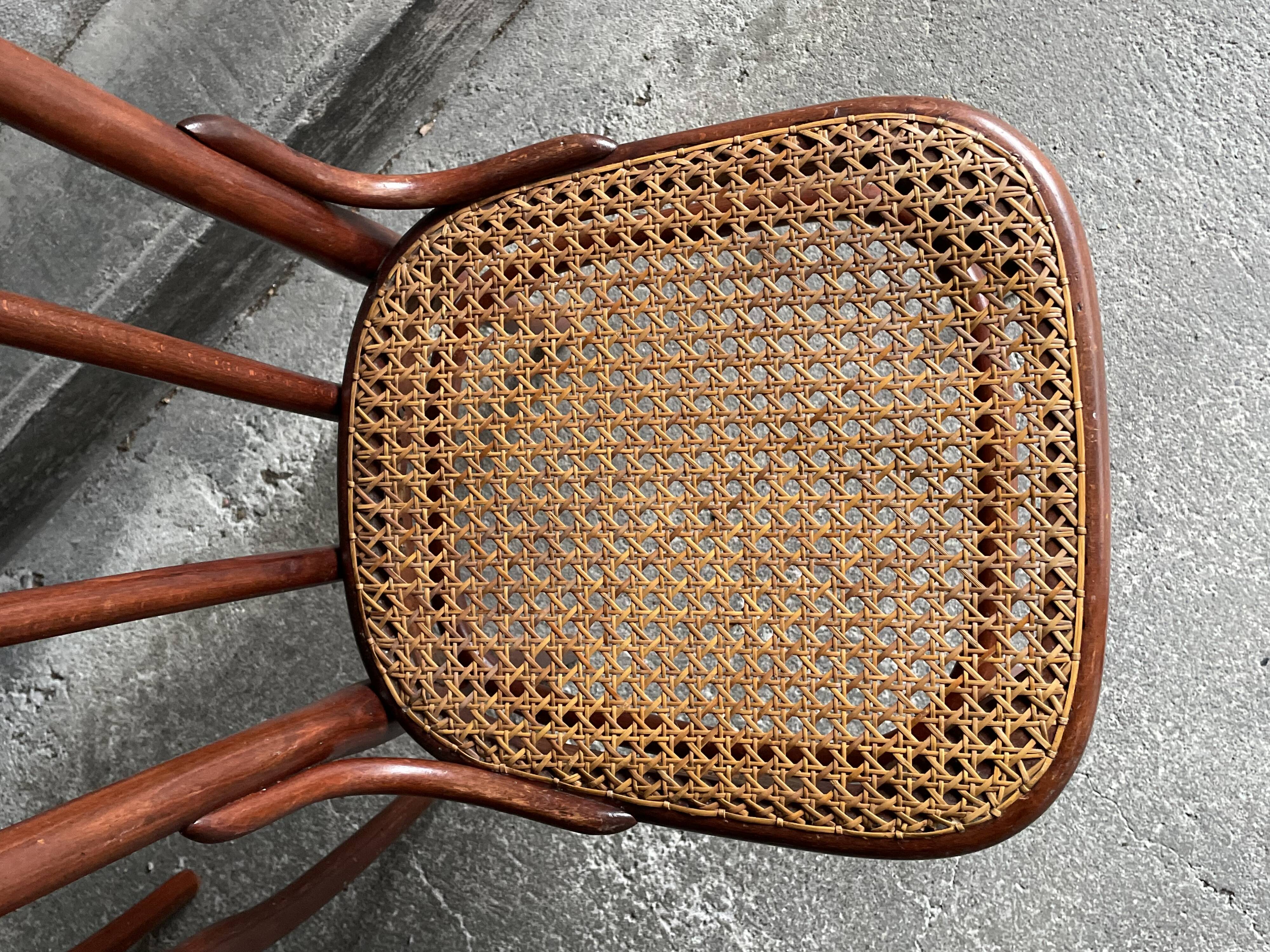 Pair of caned bistro chairs by Thonet