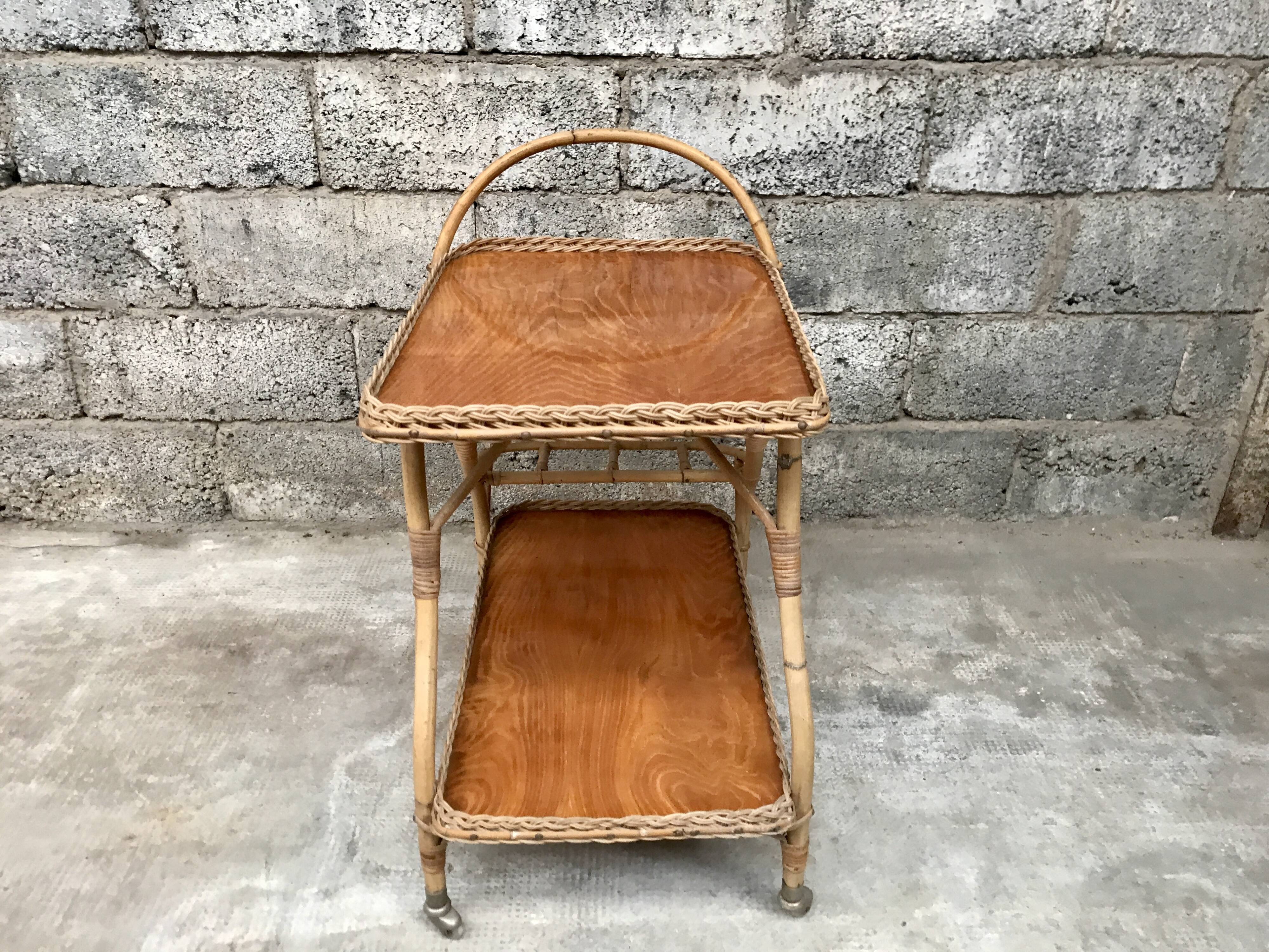 Rolling dessert in woven wicker bamboo rattan with 1950 bottle holder