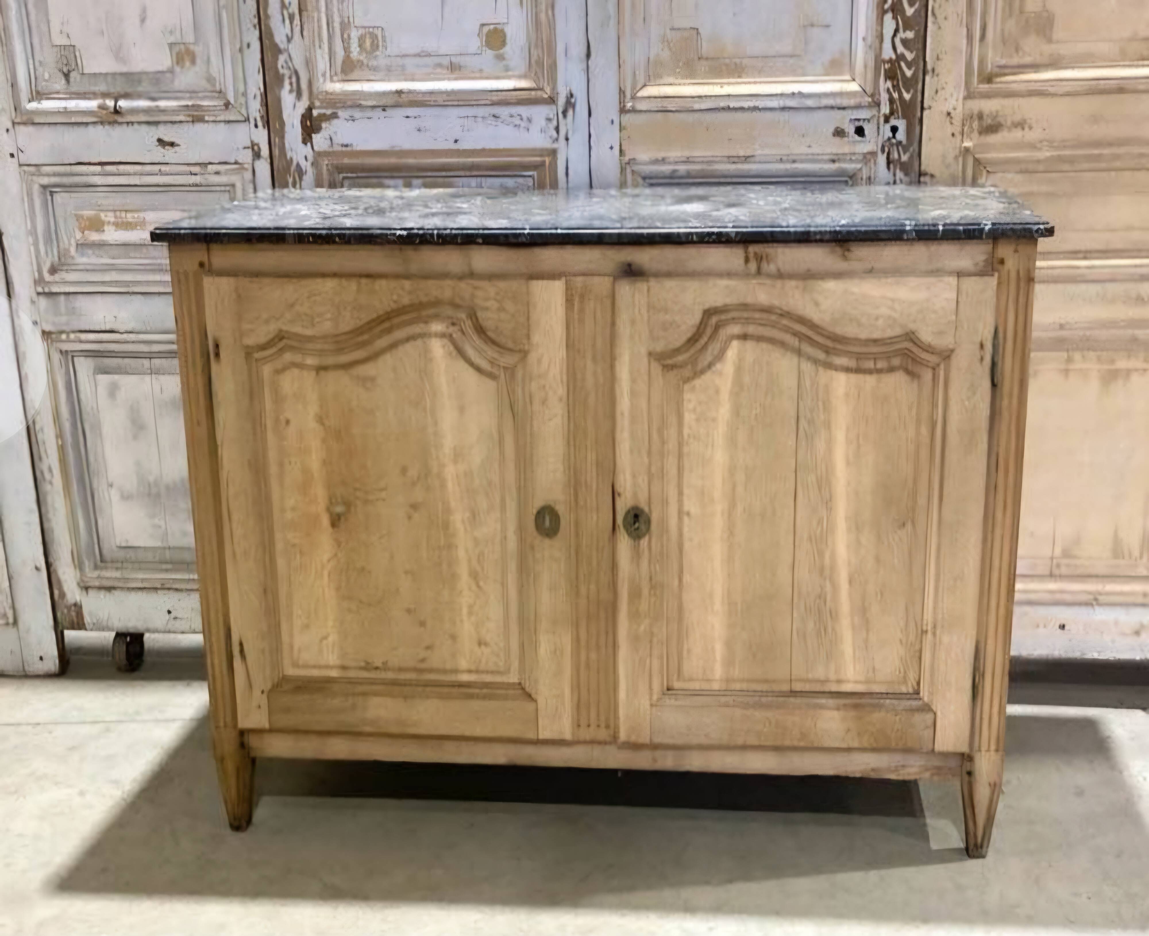 Oak buffet with a marble top from the 18th century.