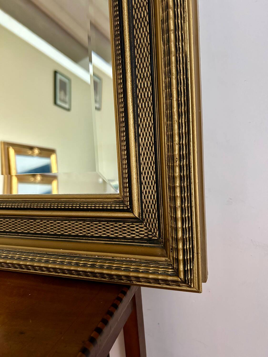 Large antique beveled mirror in the Napoleon III style - Gold and black frame