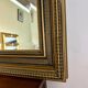 Large antique beveled mirror in the Napoleon III style - Gold and black frame
