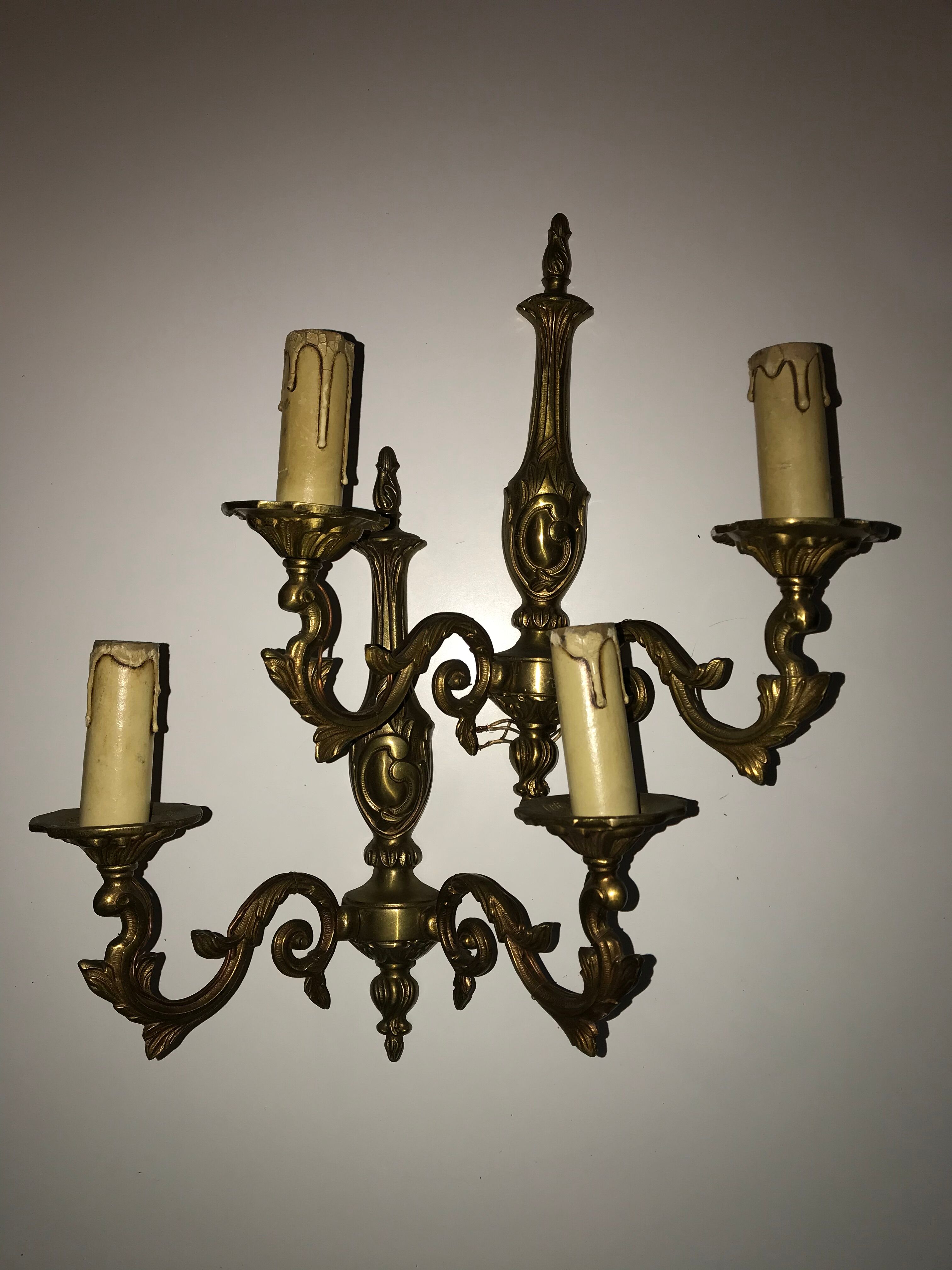 Pair of Louis XV style bronze wall sconces