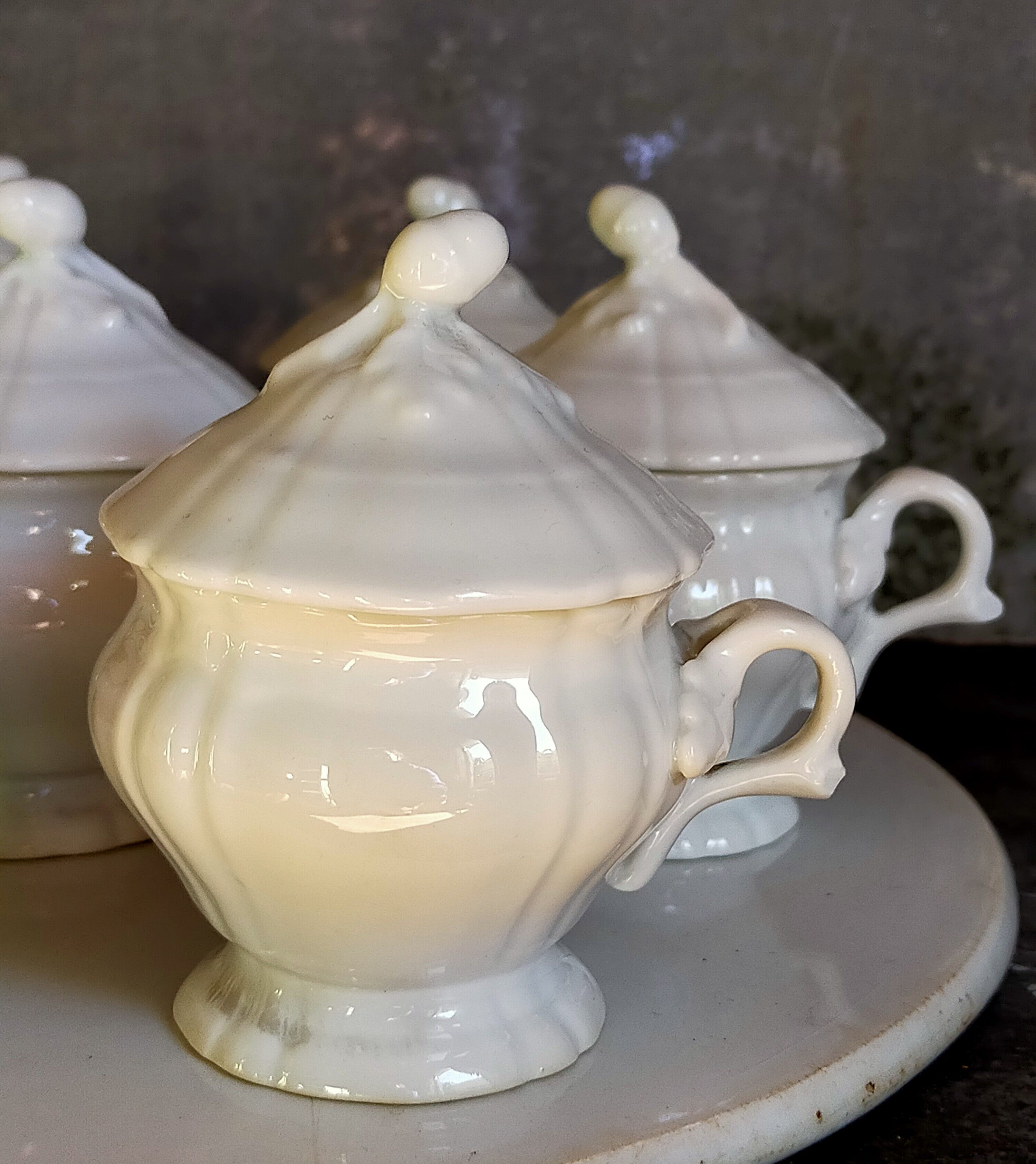 Set of seven covered pots and tray old white slurry nineteenth