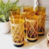 Carafe and glasses in blown amber glass and wicker