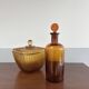 Small amber glass bottle