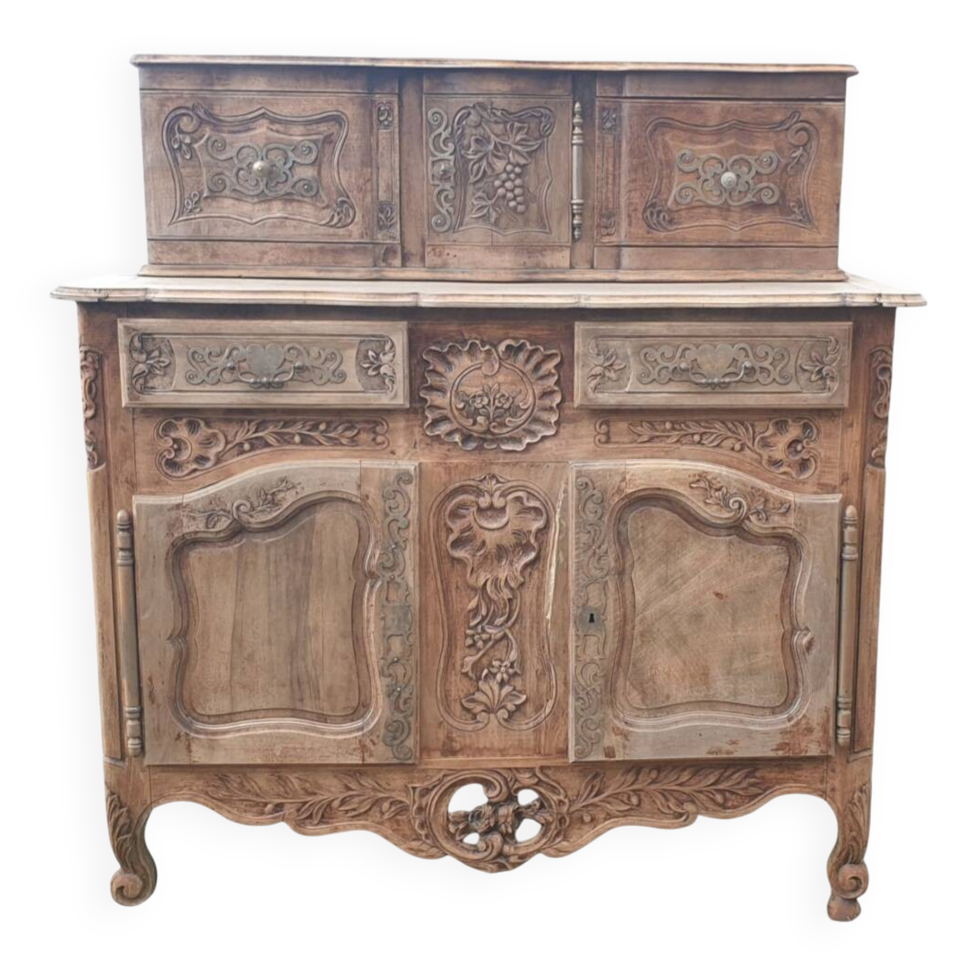 Provencal furniture in finely carved light walnut with wrought ironwork