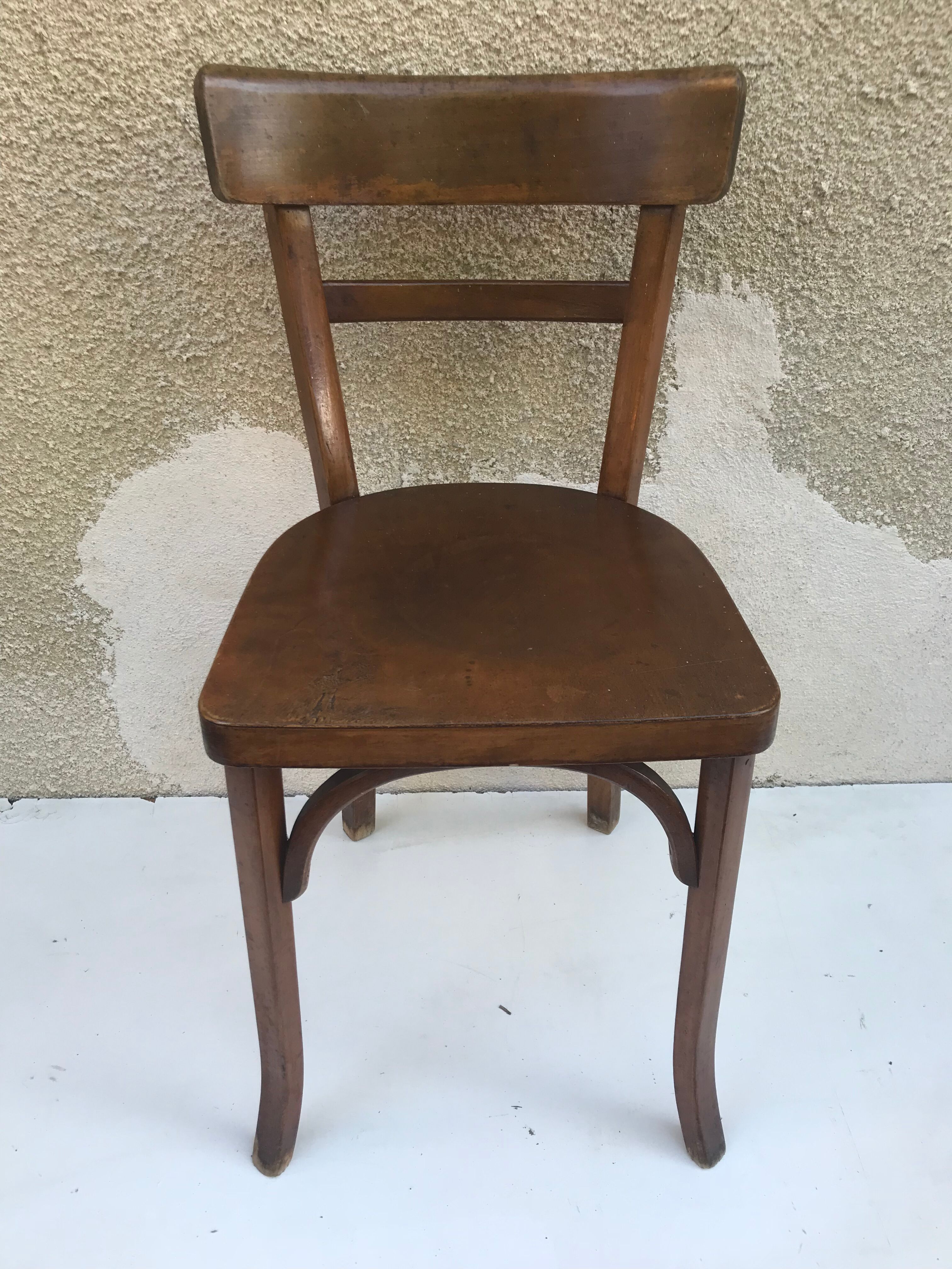 Serie de 4 chaises anciennes bistrot Baumann années 60