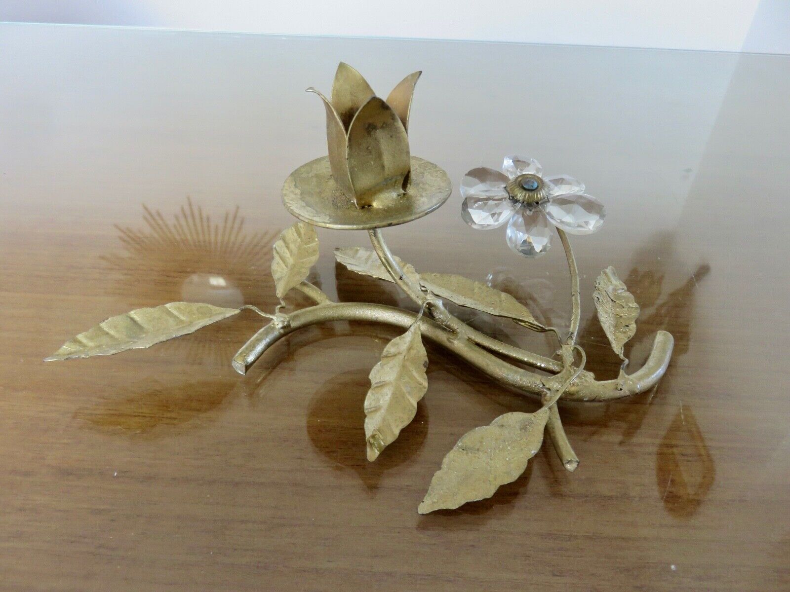 Pair of gilded metal candle holders and tassels