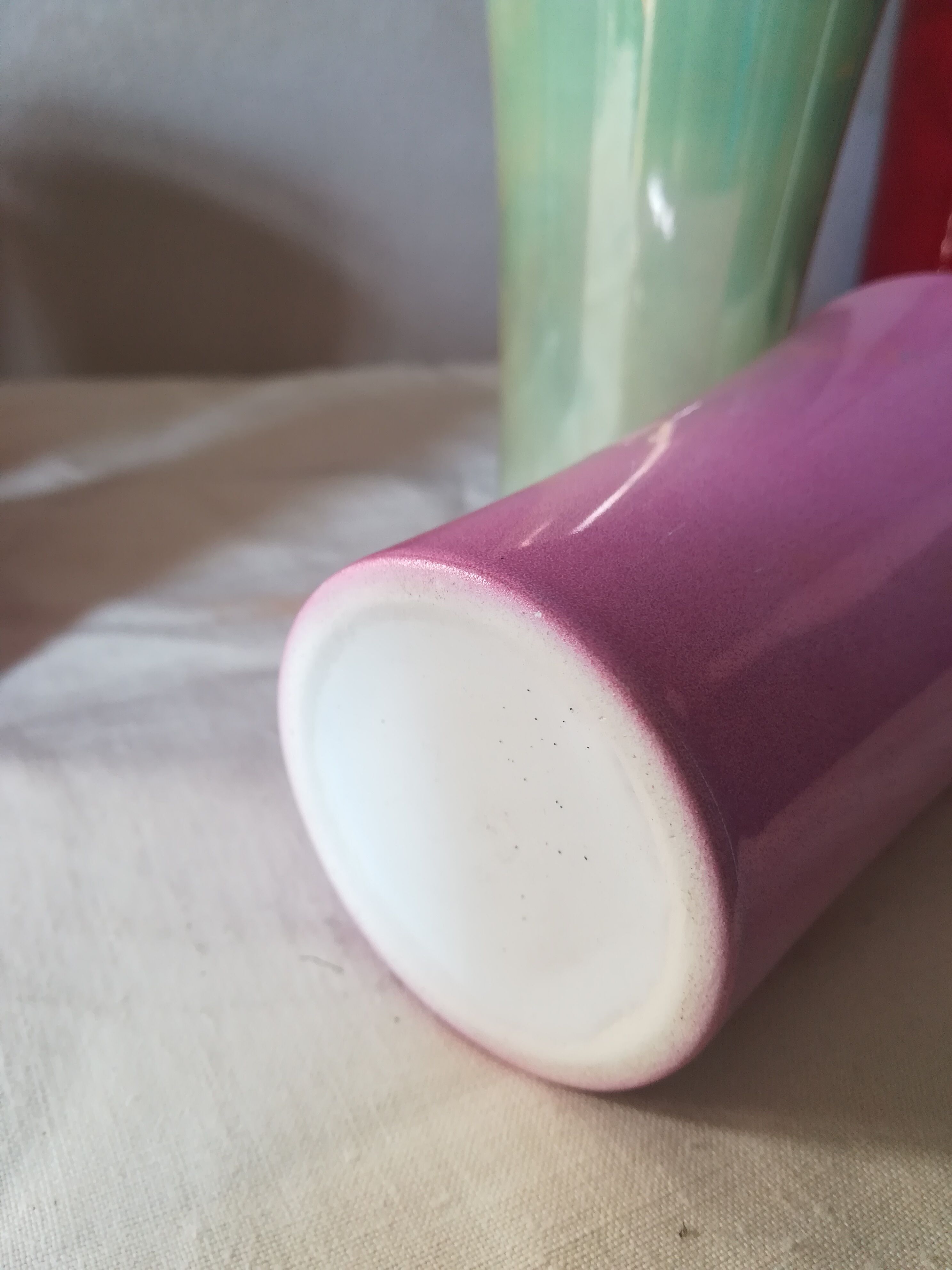 8 coloured cups in earthenware