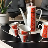 Cafetière orange et 4 tasses et pot à lait motif fleurs