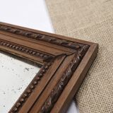 Grand miroir ancien 65cm, cadre en bois sculpté