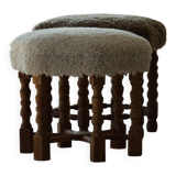 A hexagonal oak stool, seat refurbished in lambswool, Danish design from the 1950s.