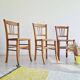 3 old wooden bistro chairs