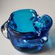 Empty pocket/Corolla shaped ashtray, in Murano style blown art glass, turquoise blue