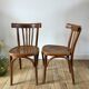 Pair of Baumann curved wood bistro chairs early twentieth century