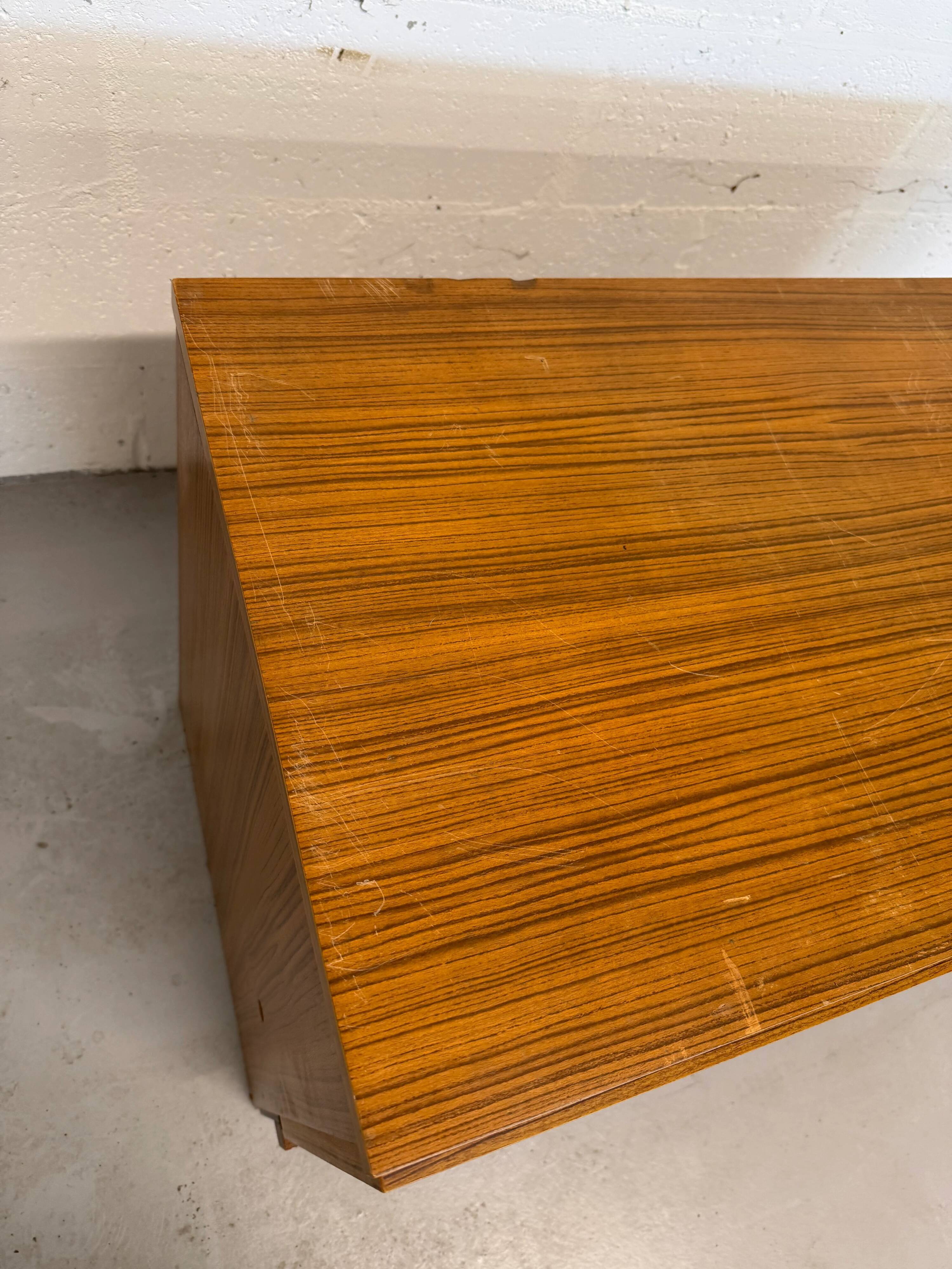 Vintage teak sideboard, mid-century style, with doors and drawers.