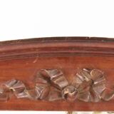 Wooden knot frontoon