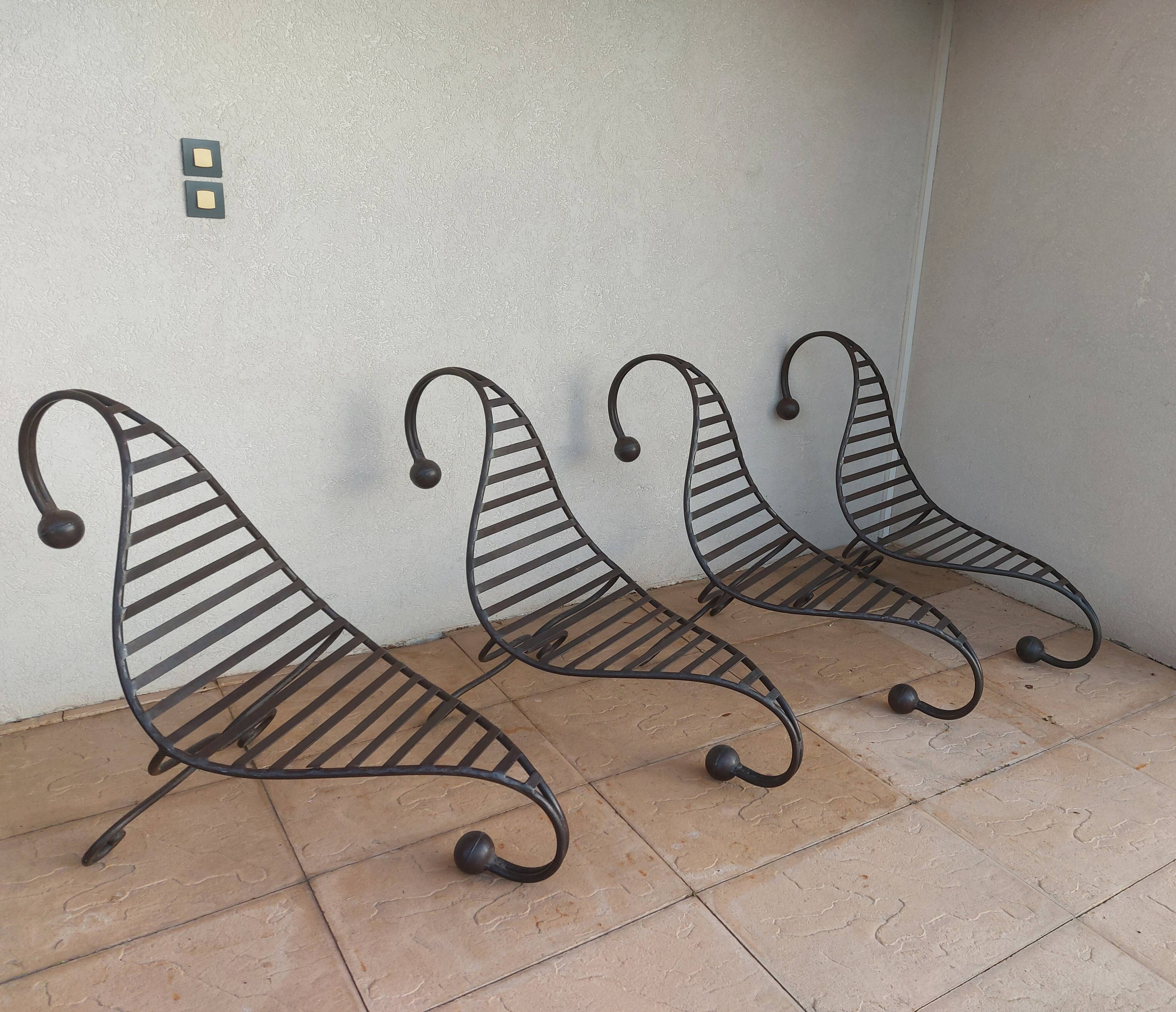 4 wrought iron deck chairs