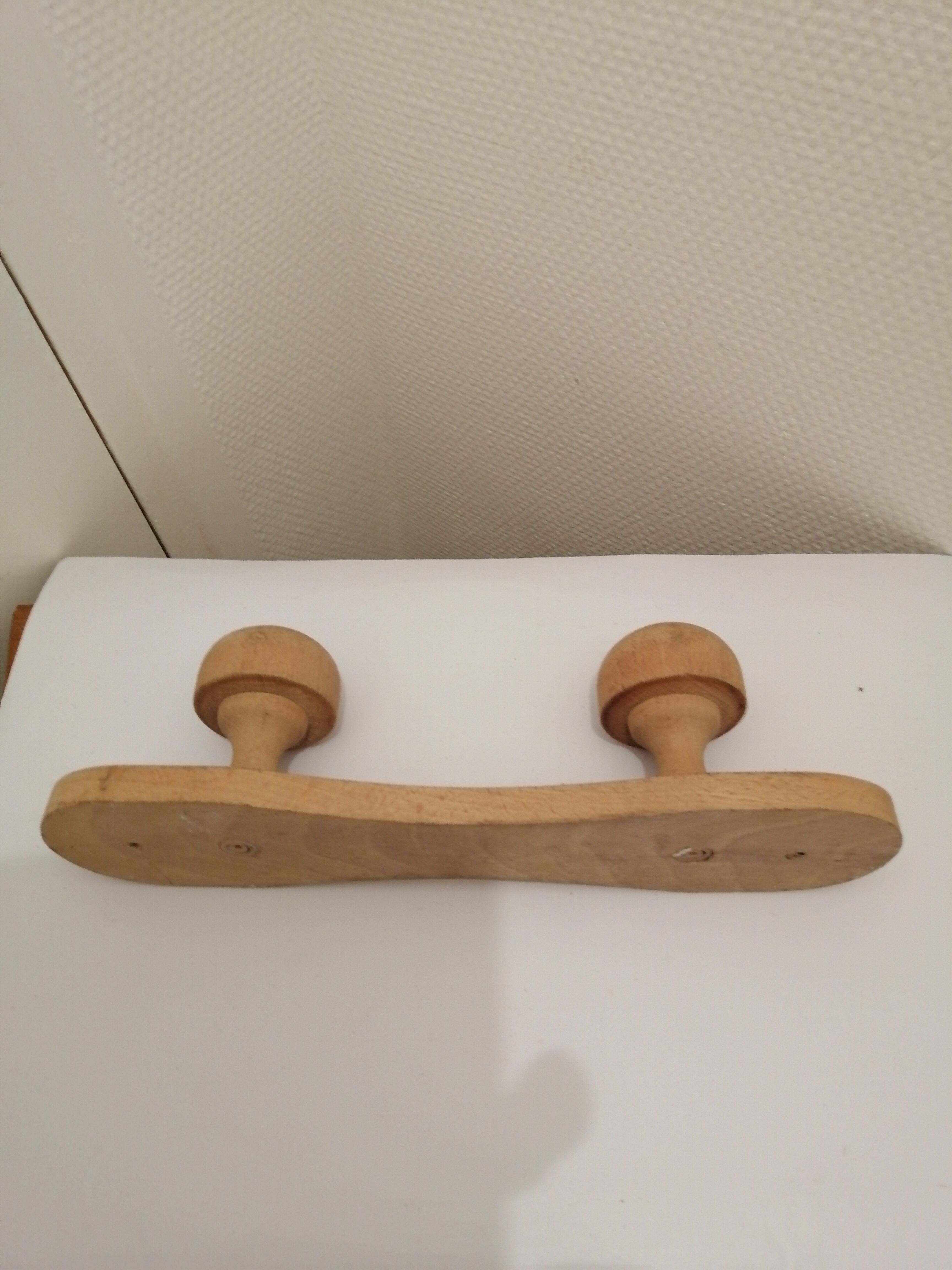 Wooden wall coat rack