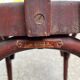 2 burgundy curved wooden bistro chairs from Ets Joseph Levallois