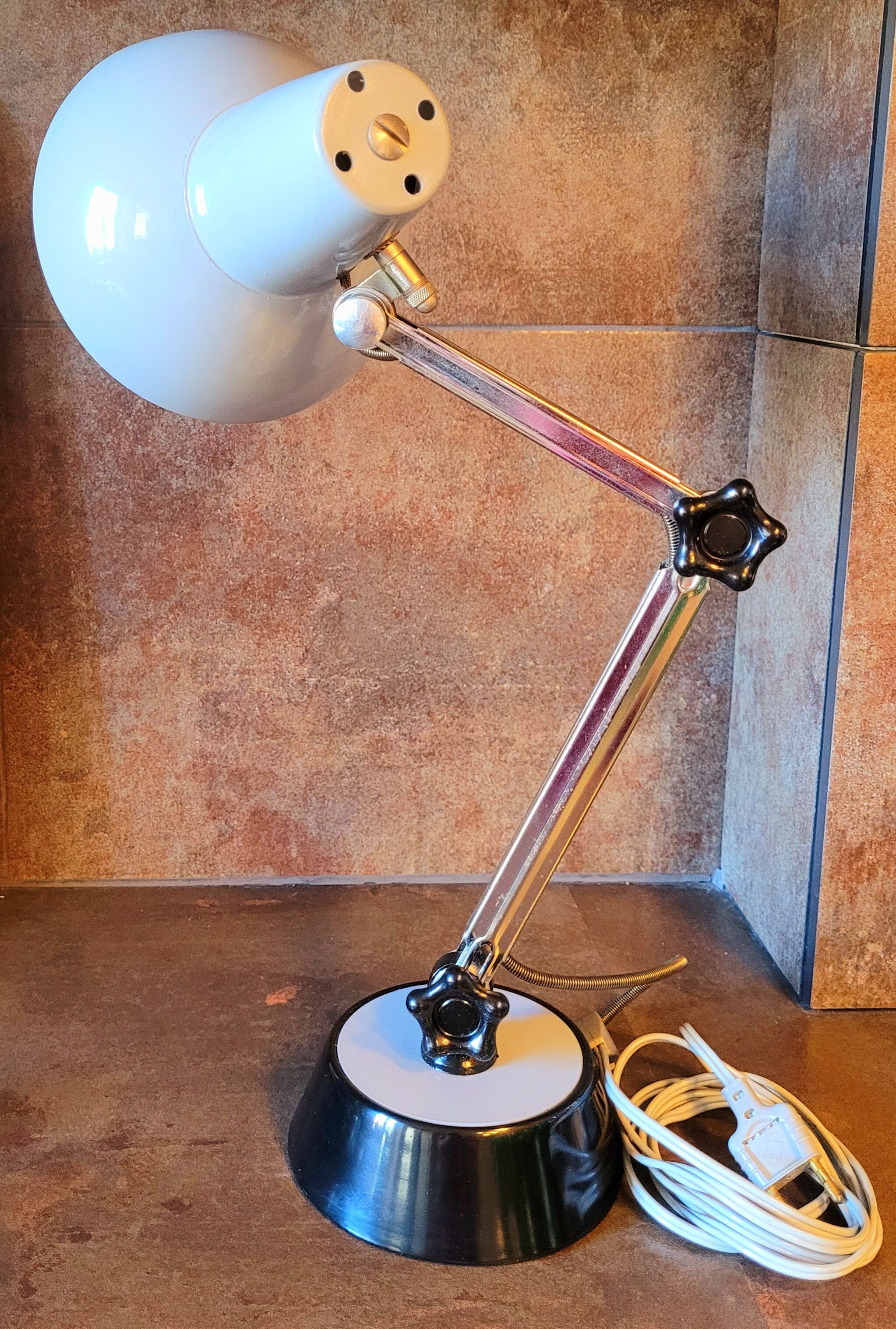 Old gray vintage articulated lamp from the 60s