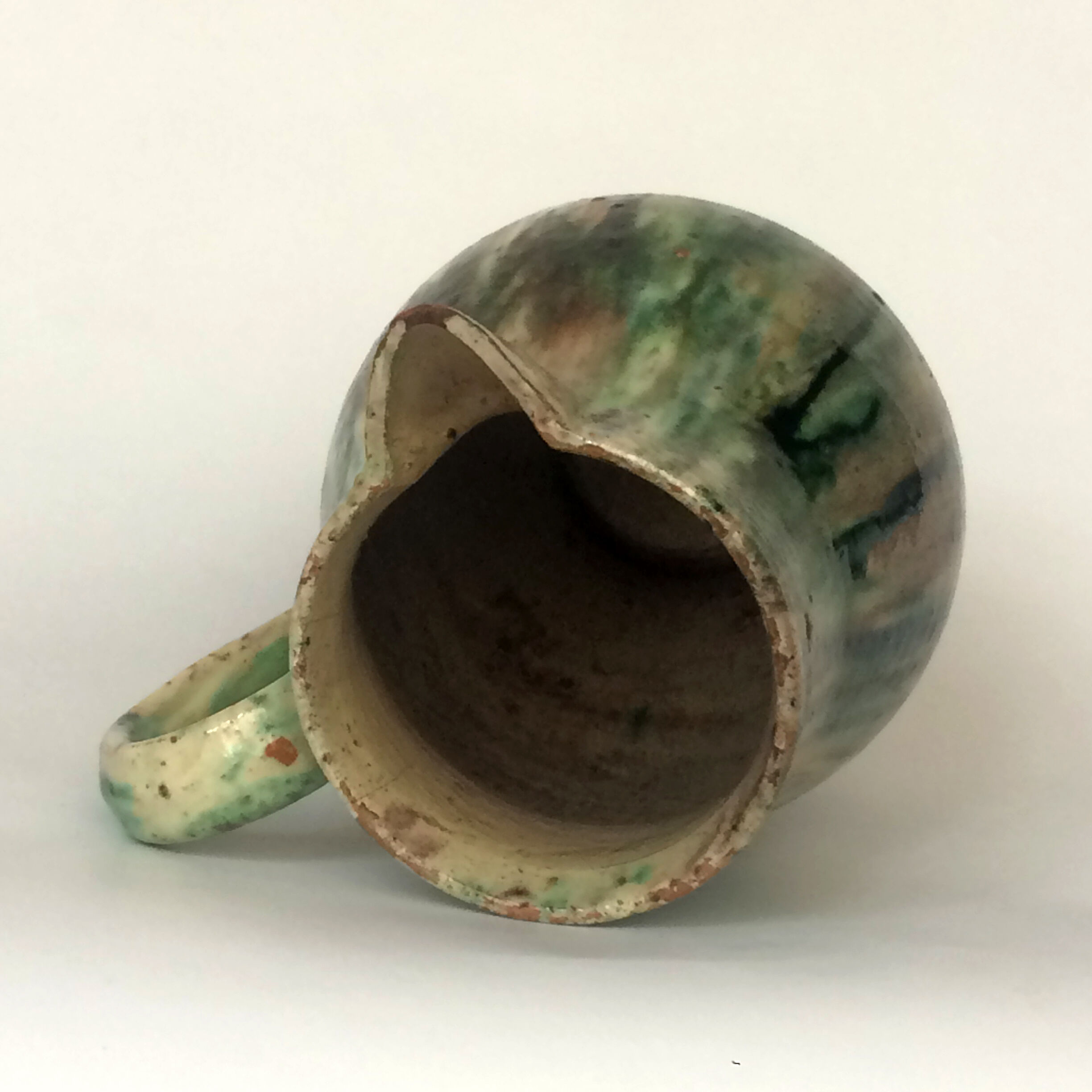 Glazed earth jug