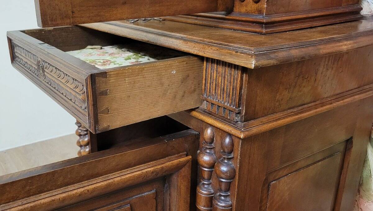 Antique solid walnut piece of furniture, finely carved, in Renaissance style.