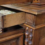 Antique solid walnut piece of furniture, finely carved, in Renaissance style.