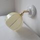 Wall lamp in opaline, brass and porcelain