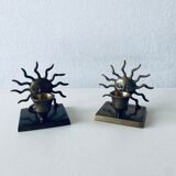 Pair of sun candle holders