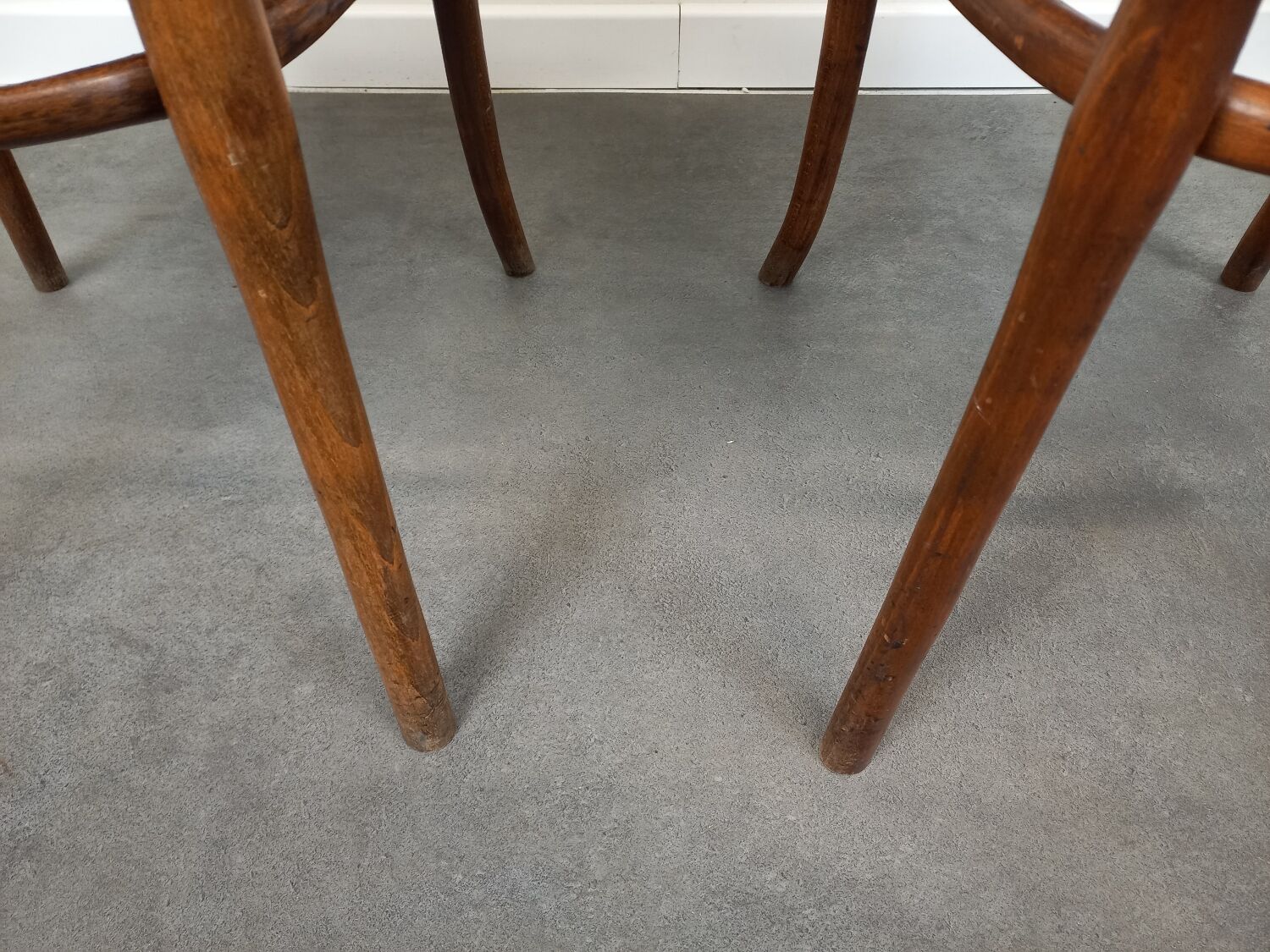 Pair of curved wooden bistro armchairs