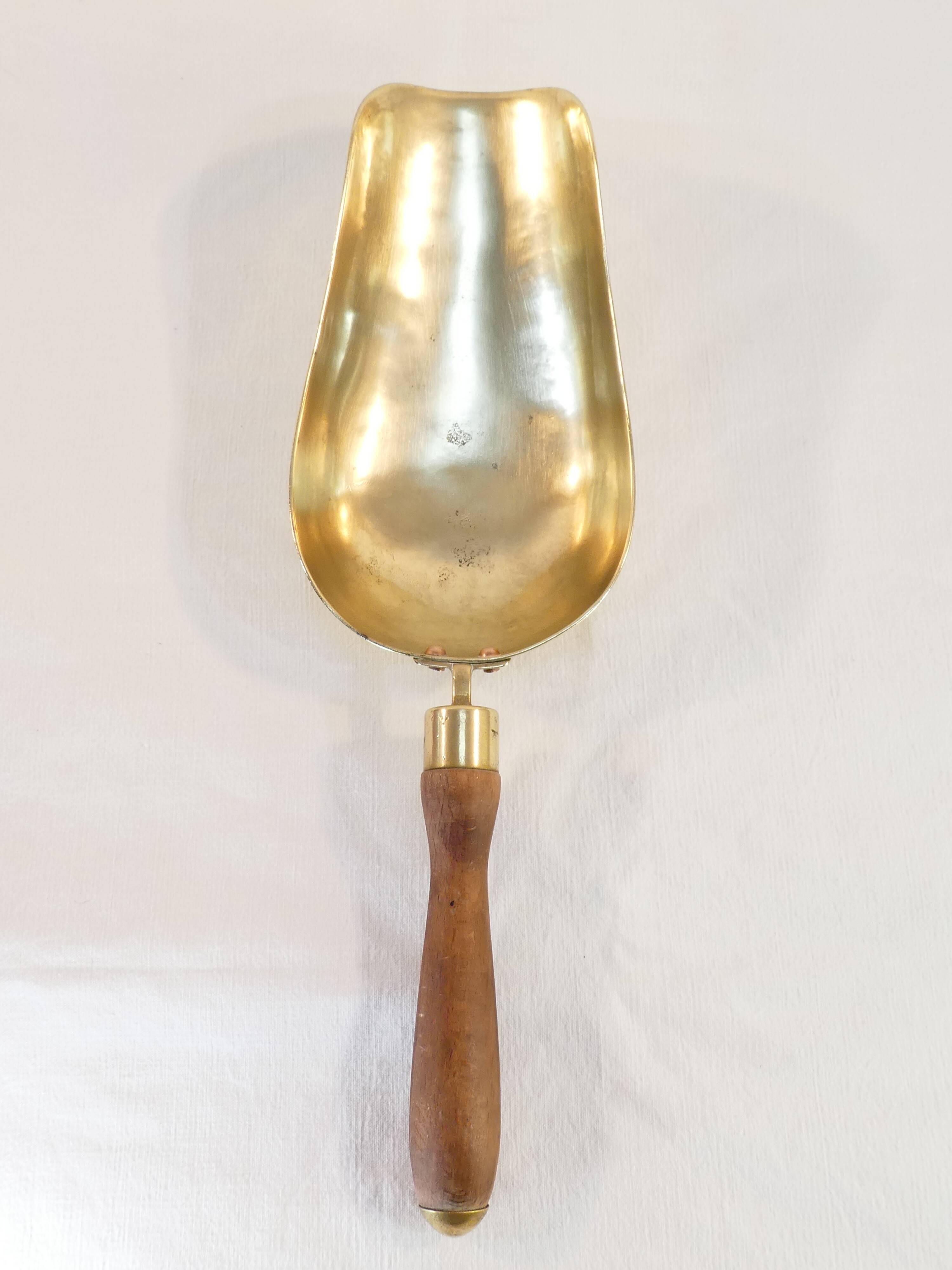 Old brass grocery grain shovel wooden handle