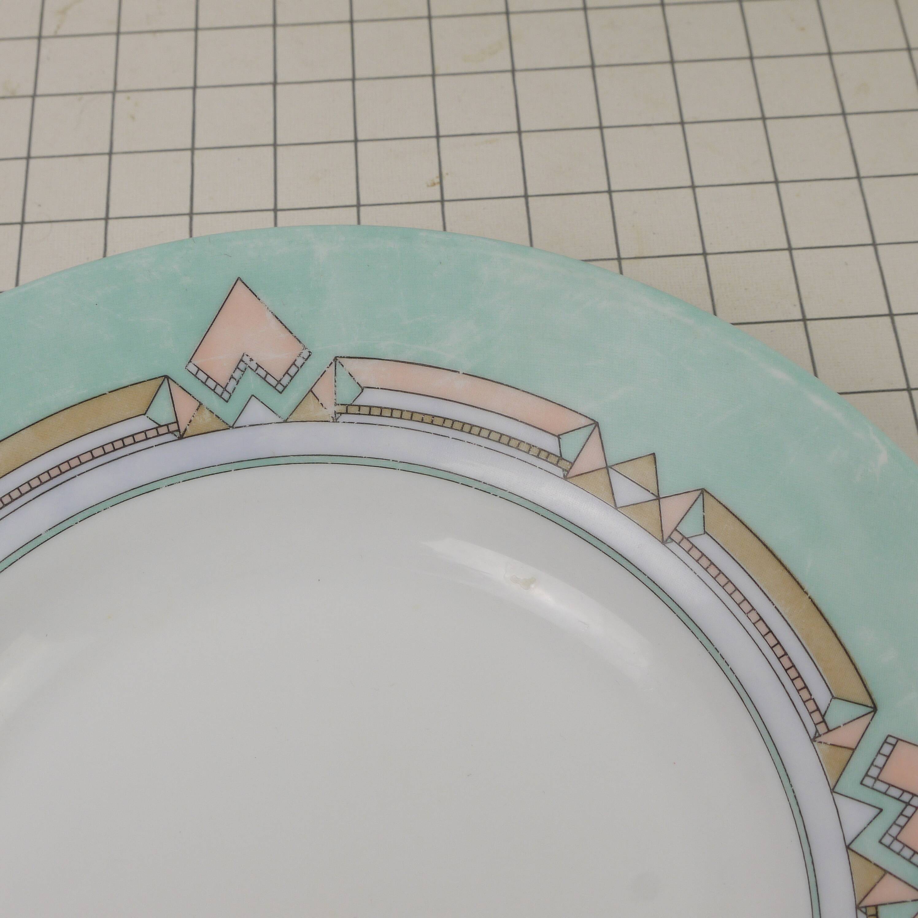 Six Arcopal soup plates