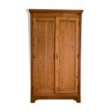 Vintage wardrobe in raw wood
