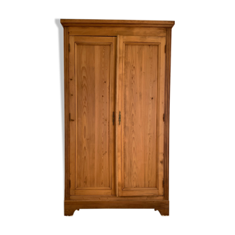 Vintage wardrobe in raw wood