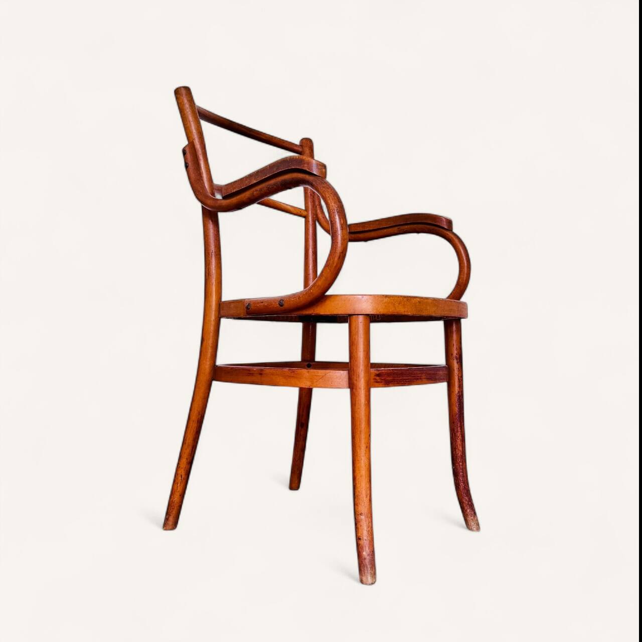1900 curved wood armchair