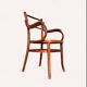 1900 curved wood armchair
