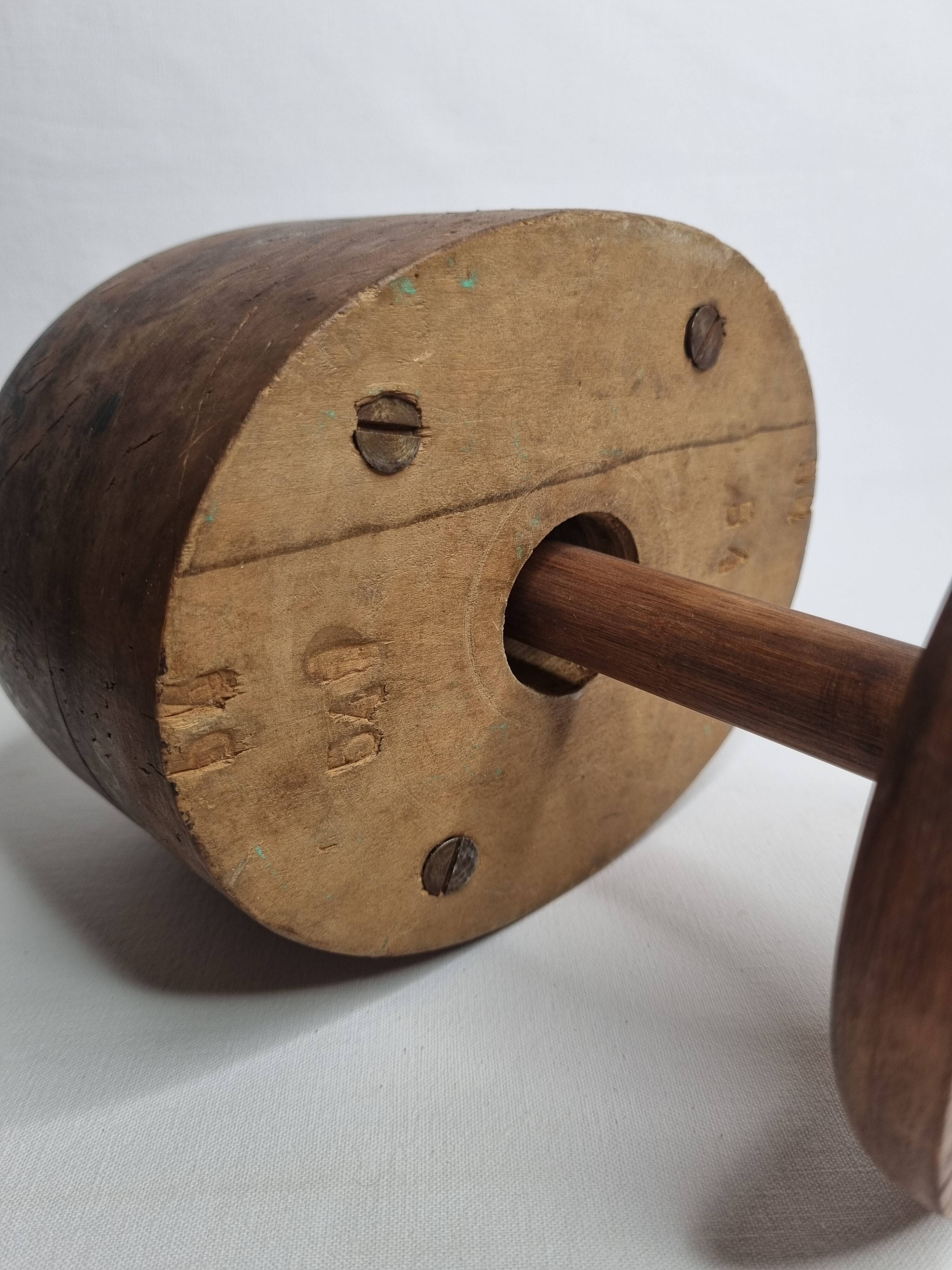 Standing wooden hat shape, 1900