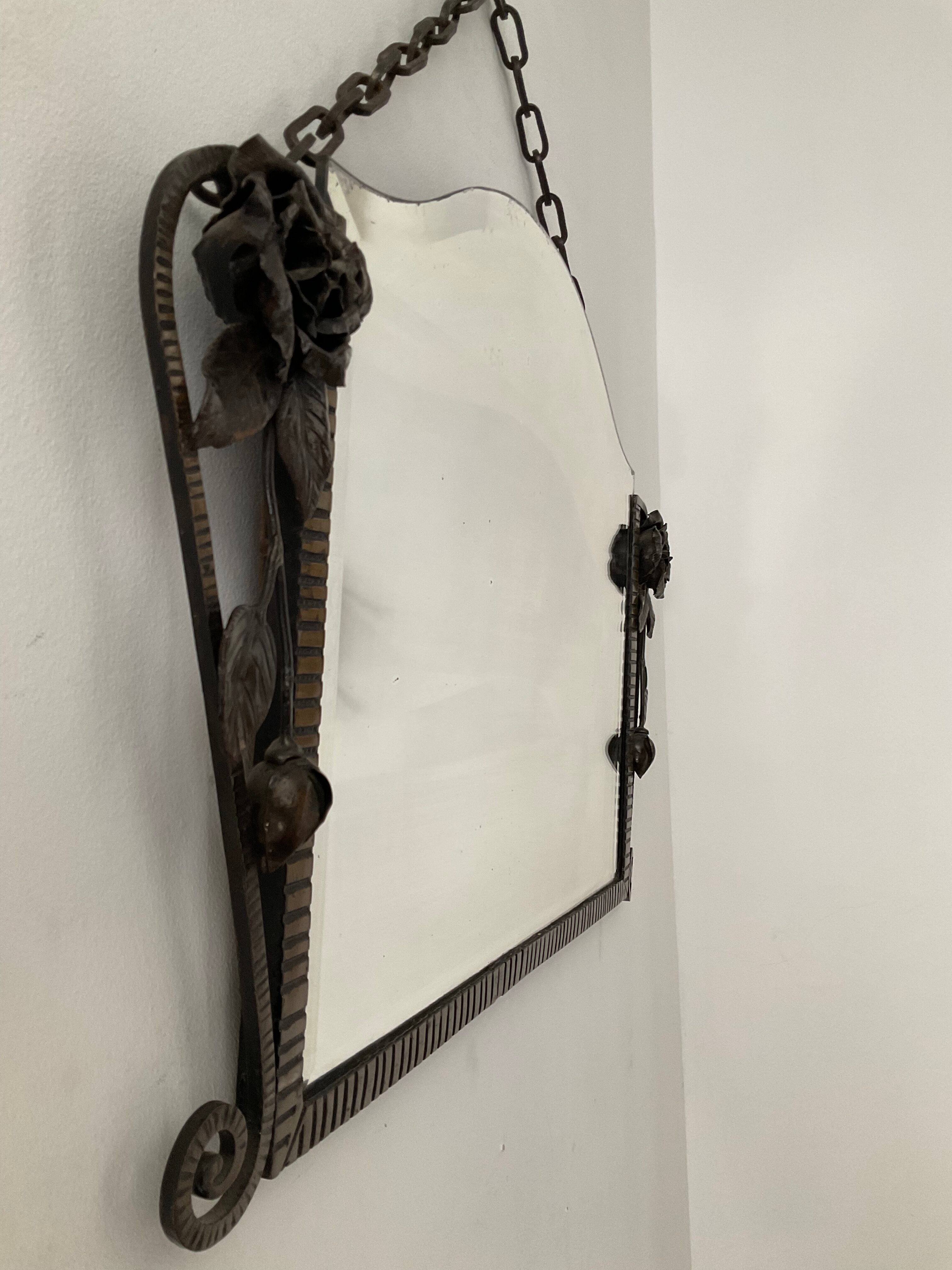 Beveled Art Deco wrought iron mirror