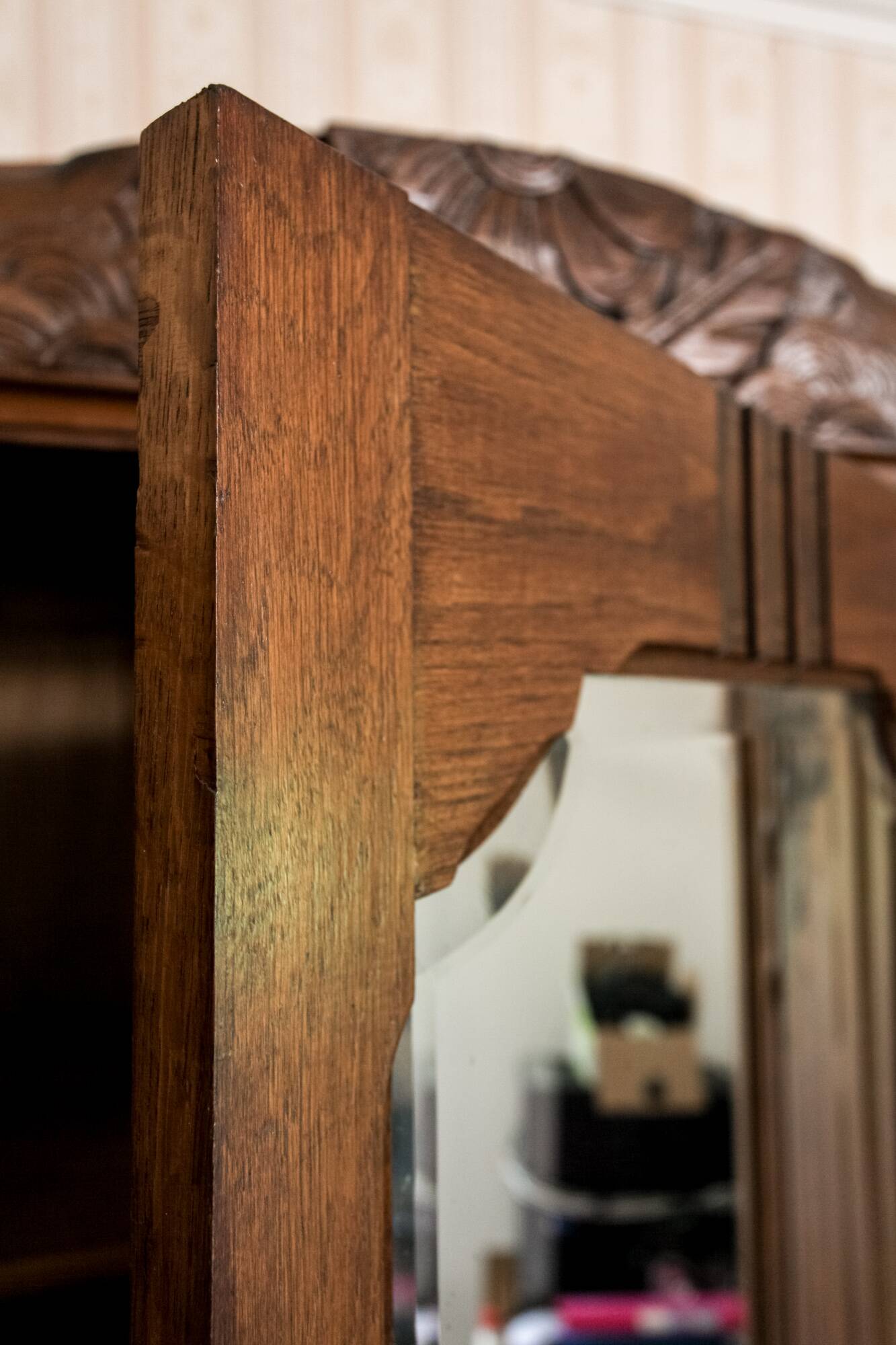 Old solid wood wardrobe with three vintage mirror doors