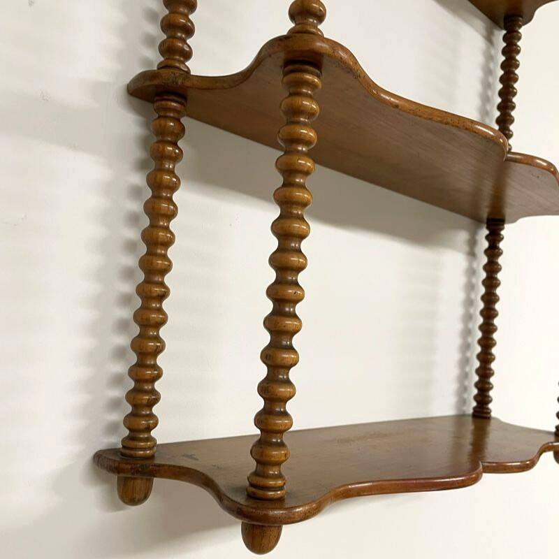 Vintage turned wood wall shelf with 3 levels.