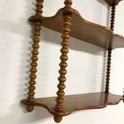 Vintage turned wood wall shelf with 3 levels.