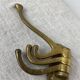 Three-pronged folding brass coat hook