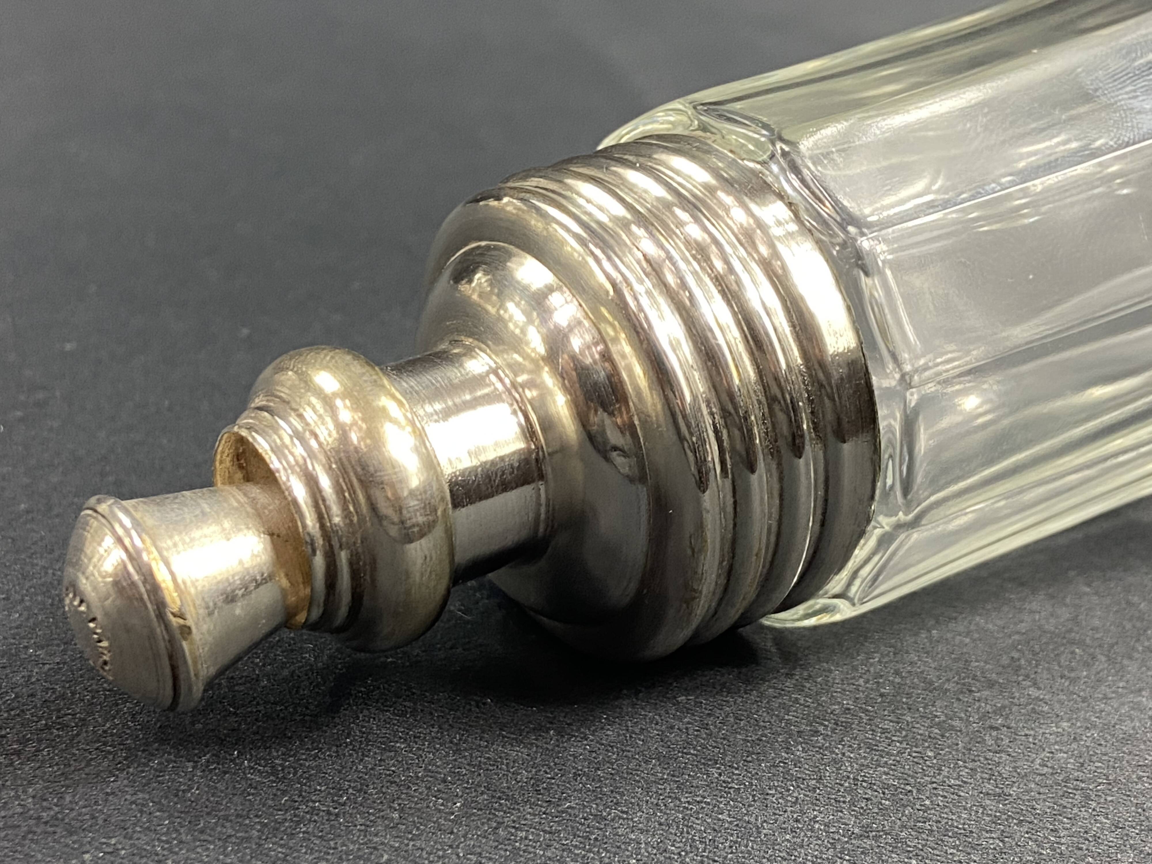 Glass and silver metal sugar shaker
