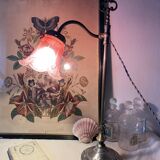 Antique jeweller's lamp, silver-plated base, frosted pink glass shade.