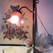 Antique jeweller's lamp, silver-plated base, frosted pink glass shade.
